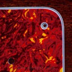 Bright red celluloid tortoise shell scratchplate material
